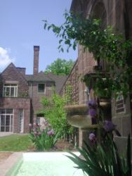 historic building with ivy and a fountain