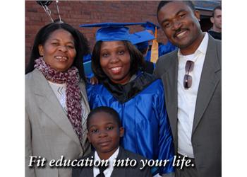 family celebrates graduation with 'fit education into your life.'