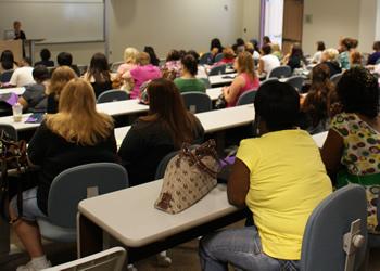 students seated in lecture hall