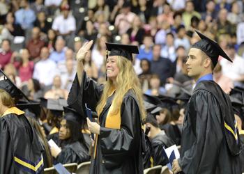 graduation ceremony with students in caps and gowns