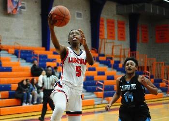 basketball player shooting during a game