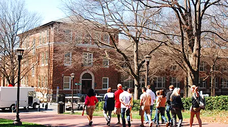 students walking in campus quad
