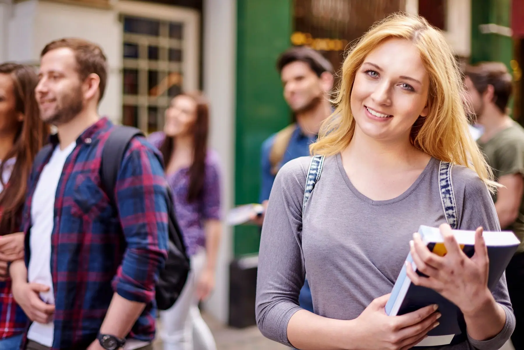 people walking on campus
